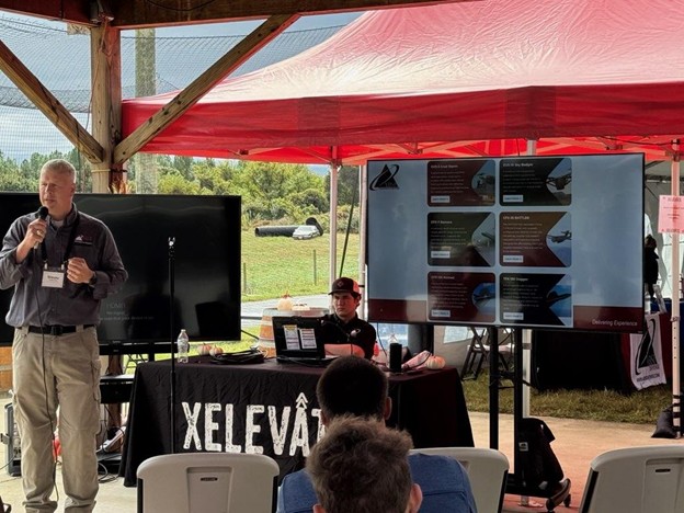 Jay Frey speaking at the Xelevate demo stage